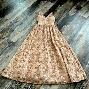 Show stopper of a gown. Perfect for prom or wedding at a black tie affair.